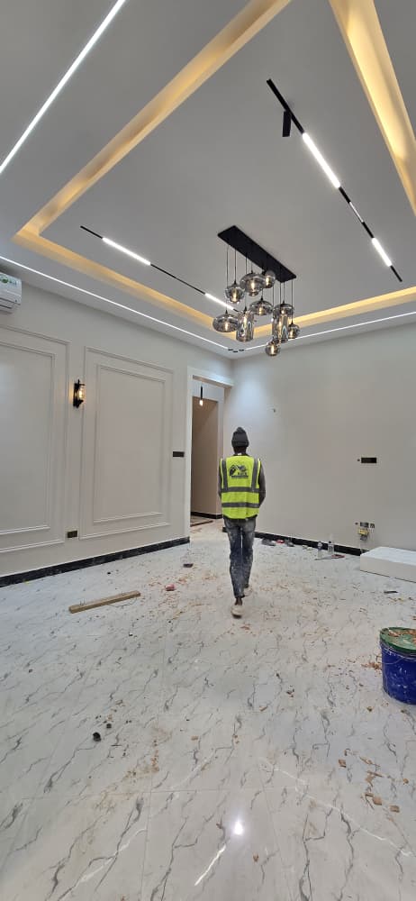 Living Hall - Designer Chandelier & Modern Track Lighting